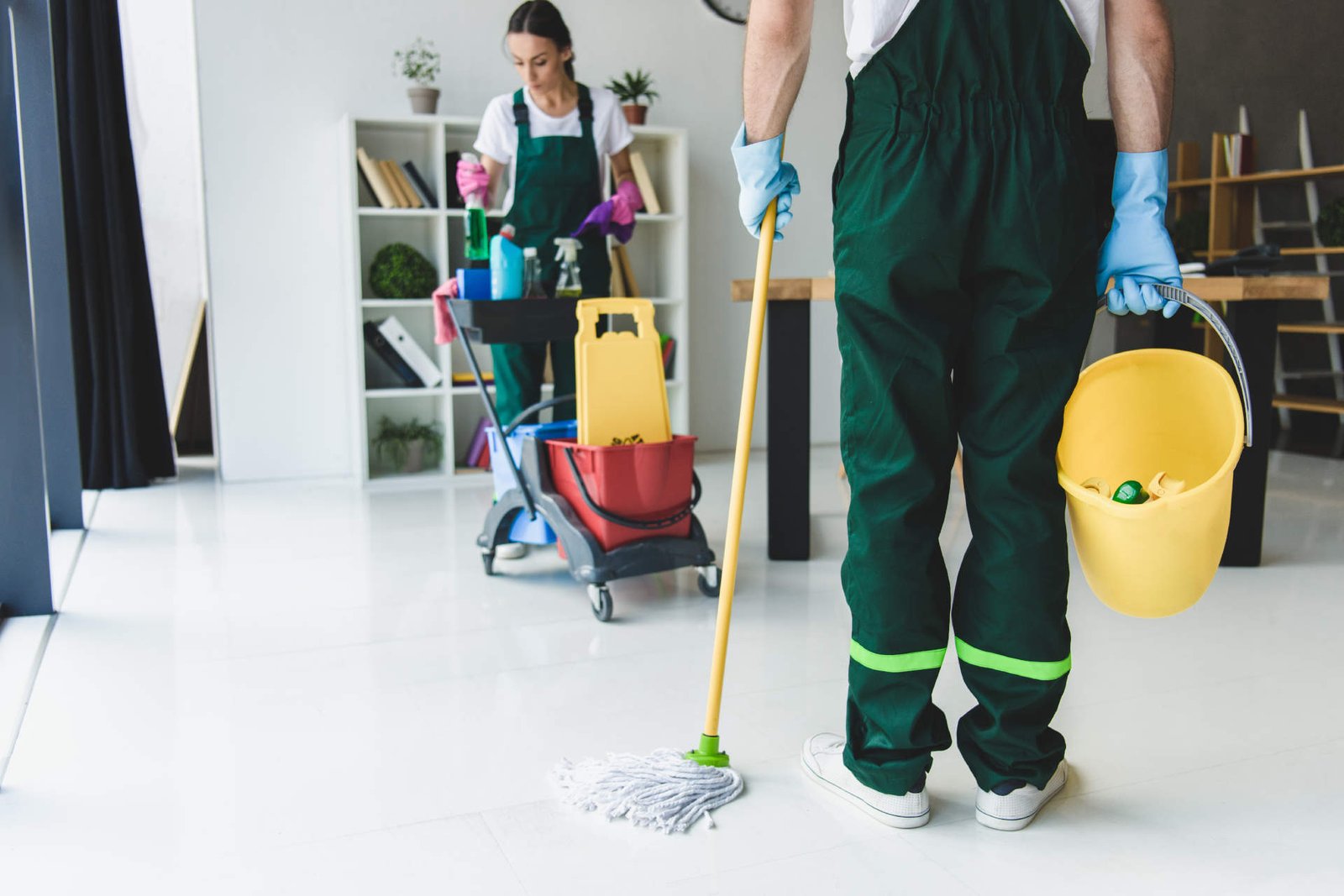 Two cleaners conducting move in / move out cleaning service